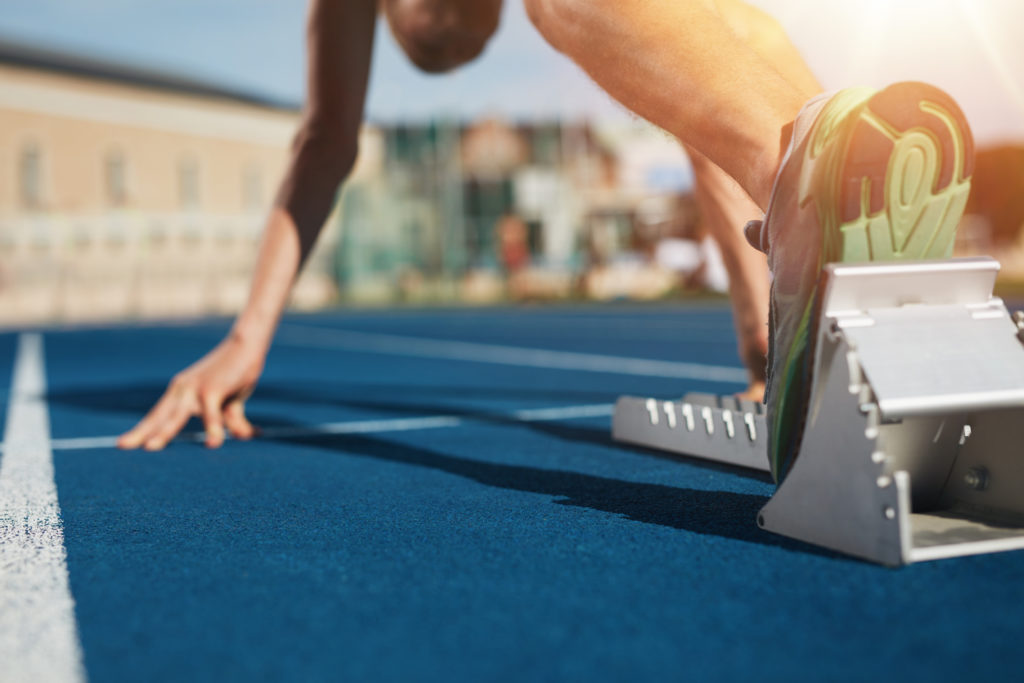 Runner at starting blocks